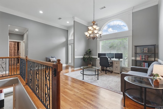 15 Challain Cv, Little Rock, AR 72223 - living room featuring crown molding, wood finished floors, a desk, recessed lighting, and a chandelier