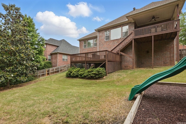 15 Challain Cv, Little Rock, AR 72223 - rear view of house with a playground, brick siding, ceiling fan, stairs, and a deck