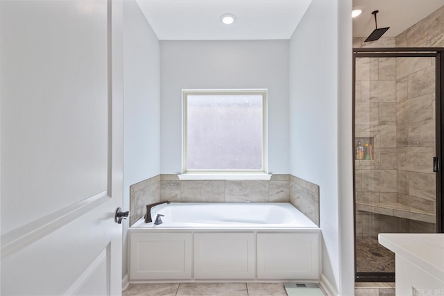 7841 S Shoreline Blvd, Benton, AR 72019 - bathroom featuring a stall shower, a bath, and tile patterned floors