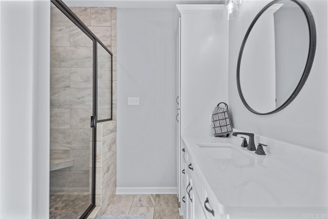 7841 S Shoreline Blvd, Benton, AR 72019 - full bath featuring a stall shower, baseboards, and vanity