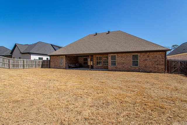 7841 S Shoreline Blvd, Benton, AR 72019 - back of house featuring a patio area, brick siding, and roof with shingles