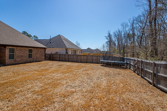 7841 S Shoreline Blvd, Benton, AR 72019 - view of yard with a trampoline