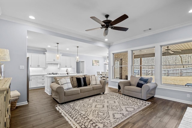 7841 S Shoreline Blvd, Benton, AR 72019 - living room with a ceiling fan, dark wood-type flooring, recessed lighting, baseboards, and ornamental molding