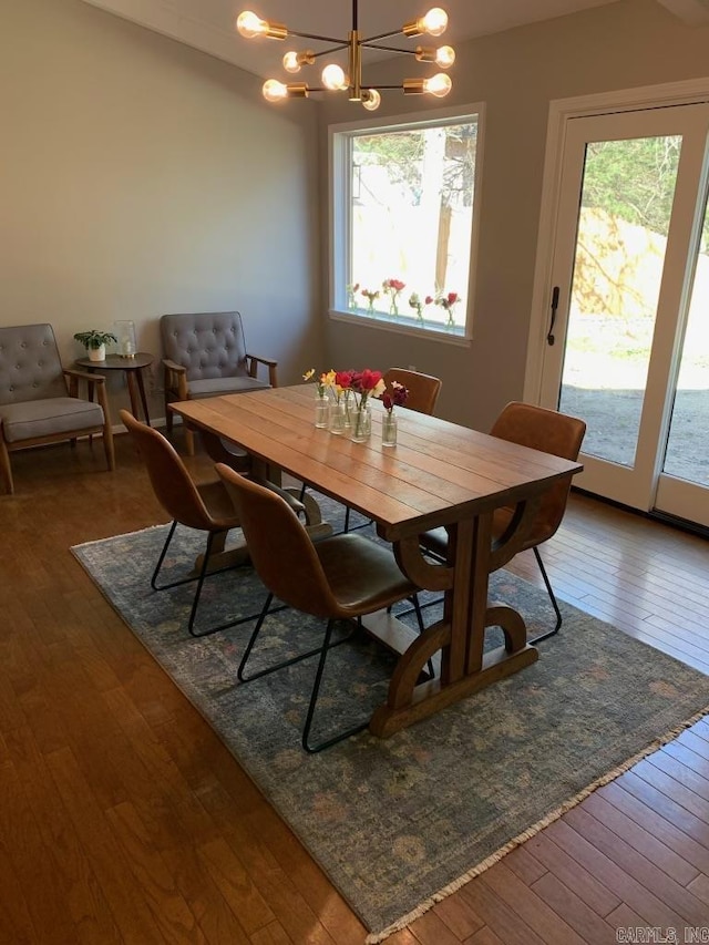 18 Riviera Dr, Conway, AR 72034 - dining space with a chandelier and wood-type flooring