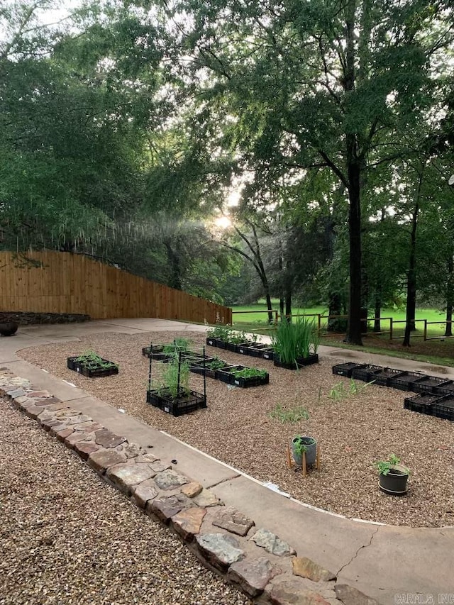 18 Riviera Dr, Conway, AR 72034 - view of home's community featuring fence and a garden