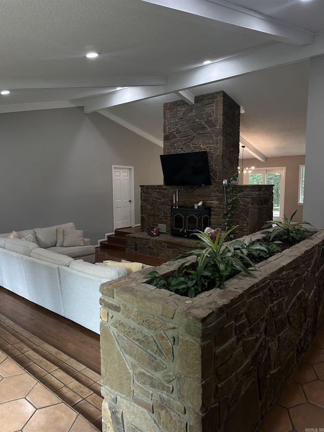 18 Riviera Dr, Conway, AR 72034 - tiled living room featuring a stone fireplace