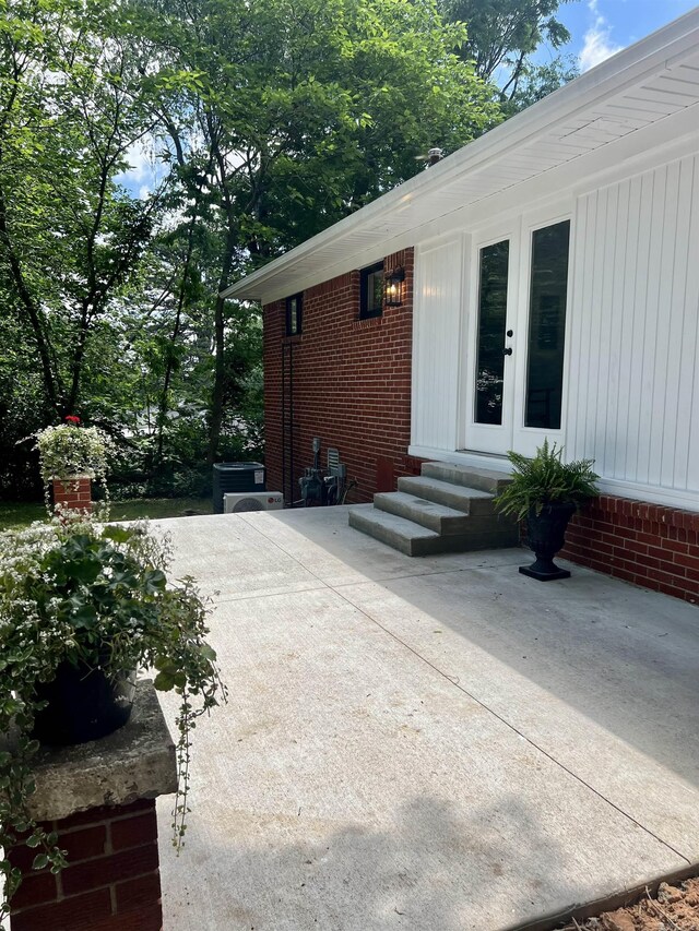 506 W Clinton St, Heber Springs, AR 72543 - view of patio / terrace with entry steps and french doors