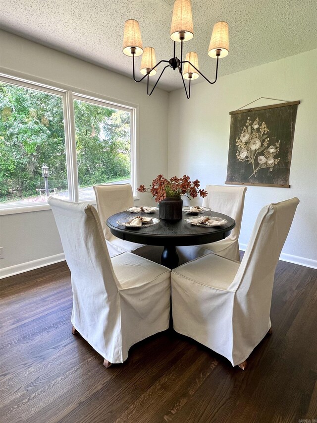 506 W Clinton St, Heber Springs, AR 72543 - dining space featuring a chandelier, baseboards, healthy amount of natural light, dark wood-type flooring, and a textured ceiling