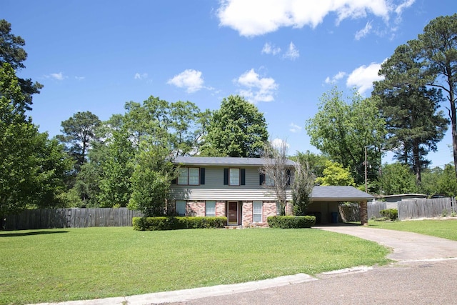 510 Frances, Magnolia, AR 71753 - view of front facade with driveway, brick siding, and a carport