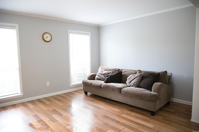 510 Frances, Magnolia, AR 71753 - living area featuring ornamental molding, light wood-style flooring, and baseboards