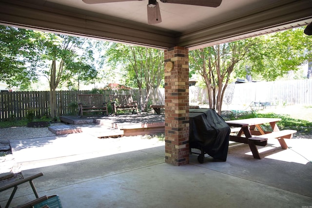 510 Frances, Magnolia, AR 71753 - view of patio featuring ceiling fan, a fenced backyard, outdoor dining area, and grilling area