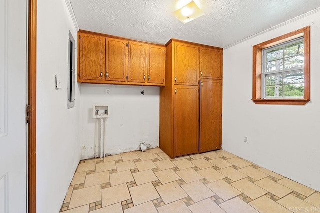 135 Cress Ln, Clinton, AR 72031 - washroom featuring cabinet space, electric dryer hookup, a textured ceiling, and hookup for a washing machine