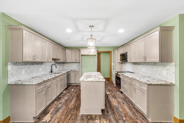 17259 Reynolds Rd, Harrisburg, AR 72432 - kitchen featuring appliances with stainless steel finishes, a sink, light stone counters, and recessed lighting