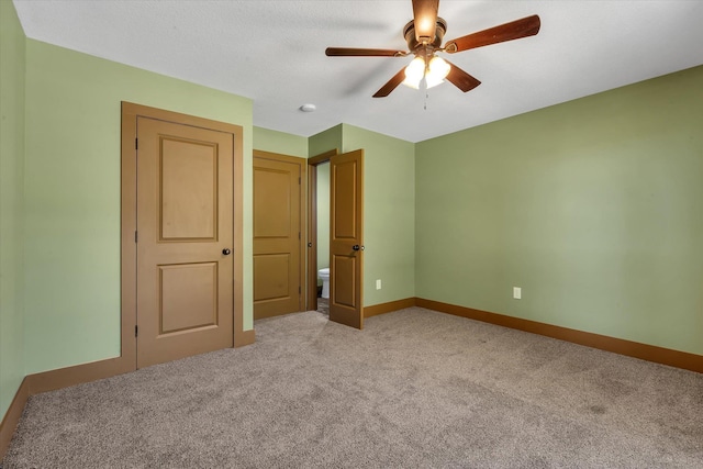 17259 Reynolds Rd, Harrisburg, AR 72432 - unfurnished bedroom featuring carpet, baseboards, and ceiling fan