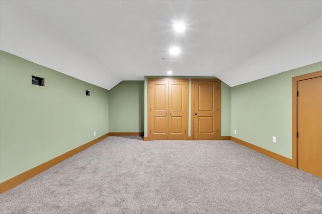 17259 Reynolds Rd, Harrisburg, AR 72432 - additional living space featuring lofted ceiling, baseboards, carpet, and recessed lighting