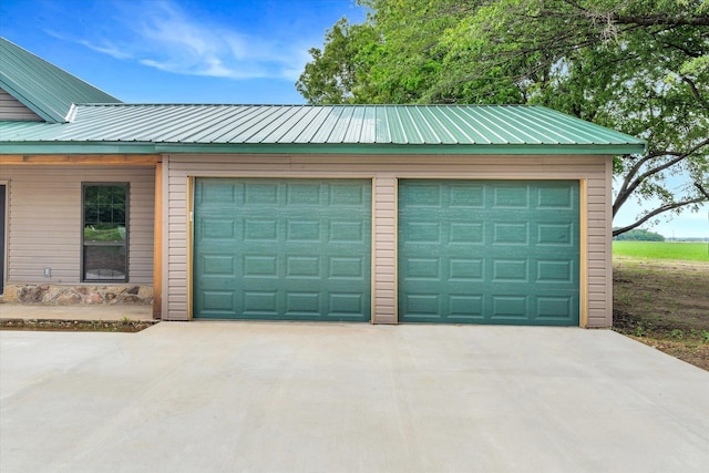 17259 Reynolds Rd, Harrisburg, AR 72432 - garage featuring concrete driveway