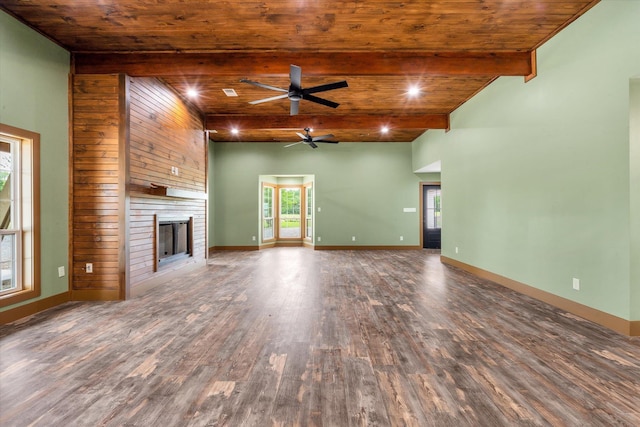 17259 Reynolds Rd, Harrisburg, AR 72432 - unfurnished living room with a ceiling fan, wood finished floors, a fireplace, wooden ceiling, and beamed ceiling