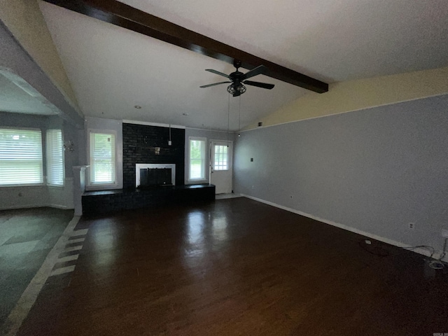 unfurnished living room with a ceiling fan, wood finished floors, baseboards, and a fireplace