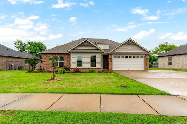 1710 Josh Dr, Conway, AR 72034 - view of front facade with brick siding, concrete driveway, central air condition unit, and an attached garage