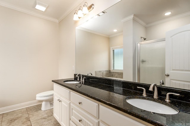1710 Josh Dr, Conway, AR 72034 - bathroom featuring a shower stall, toilet, crown molding, baseboards, and double vanity