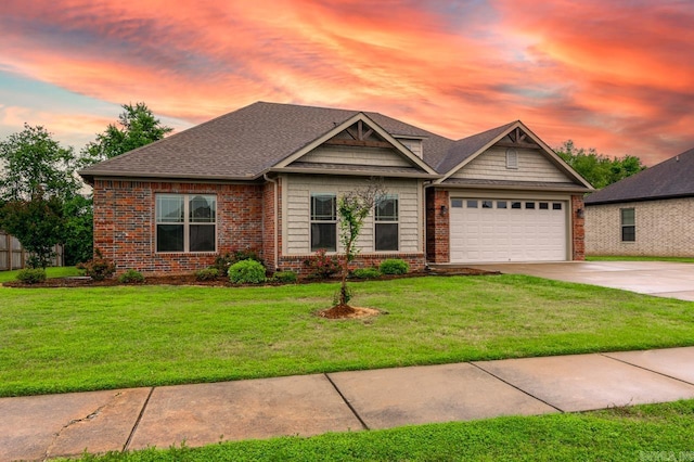 1710 Josh Dr, Conway, AR 72034 - view of front of home featuring concrete driveway, brick siding, a garage, and a yard