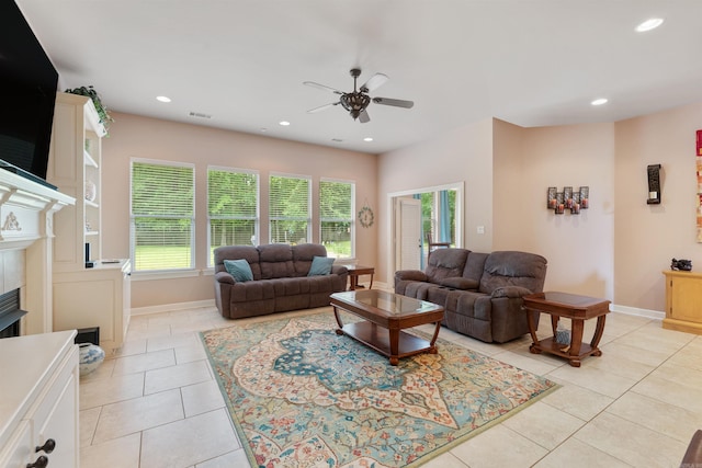 529 Enchanted Valley Ln, North Little Rock, AR 72118 - living room with a ceiling fan, healthy amount of natural light, light tile patterned floors, a fireplace, and recessed lighting