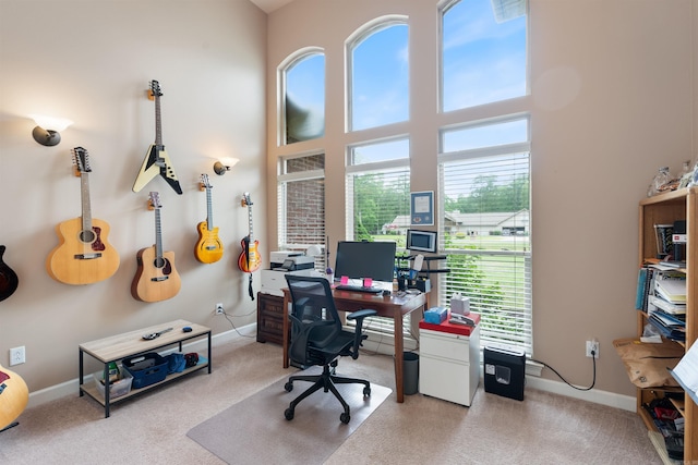 529 Enchanted Valley Ln, North Little Rock, AR 72118 - office with carpet flooring, baseboards, and a towering ceiling