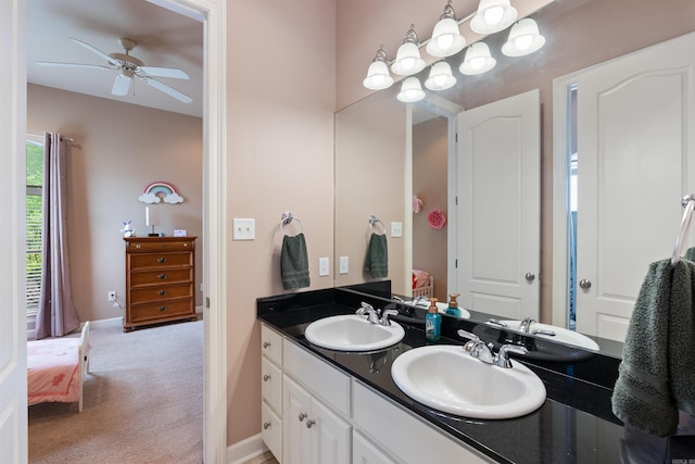 529 Enchanted Valley Ln, North Little Rock, AR 72118 - ensuite bathroom with ceiling fan and double vanity