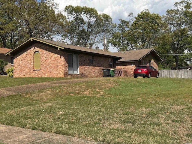 view of home's exterior featuring brick siding