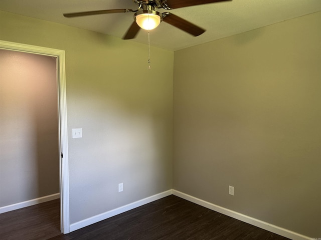 251 Grouse Trl, Pocahontas, AR 72455 - unfurnished room featuring a ceiling fan, dark wood finished floors, and baseboards