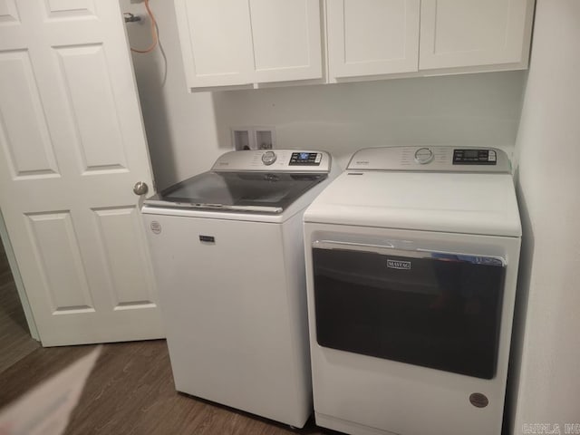 251 Grouse Trl, Pocahontas, AR 72455 - washroom featuring washing machine and dryer, dark wood finished floors, and cabinet space