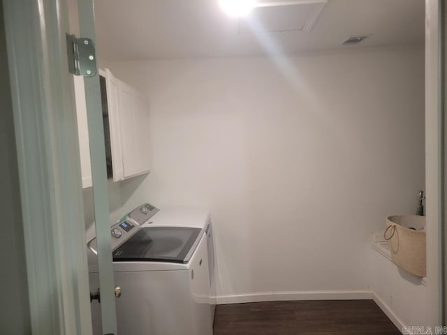 251 Grouse Trl, Pocahontas, AR 72455 - laundry area with cabinet space, washing machine and dryer, dark wood-style flooring, and baseboards