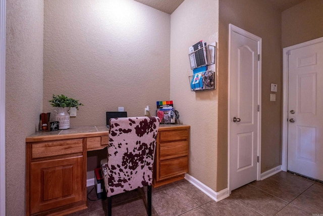 3407 Hemlock Cv, Benton, AR 72015 - tiled home office featuring a textured wall and baseboards