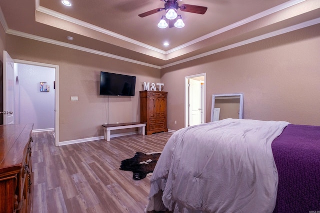 3407 Hemlock Cv, Benton, AR 72015 - bedroom featuring a raised ceiling, wood finished floors, ornamental molding, baseboards, and recessed lighting