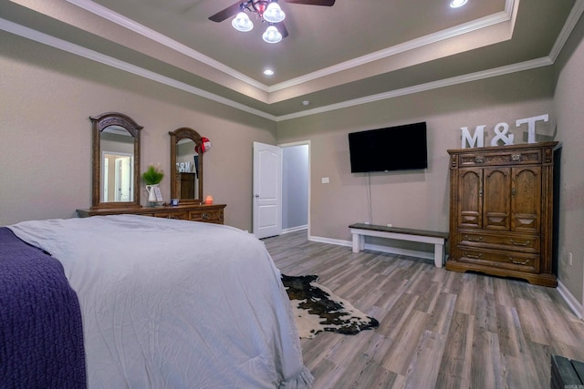 3407 Hemlock Cv, Benton, AR 72015 - bedroom with wood finished floors, a raised ceiling, baseboards, recessed lighting, and ornamental molding