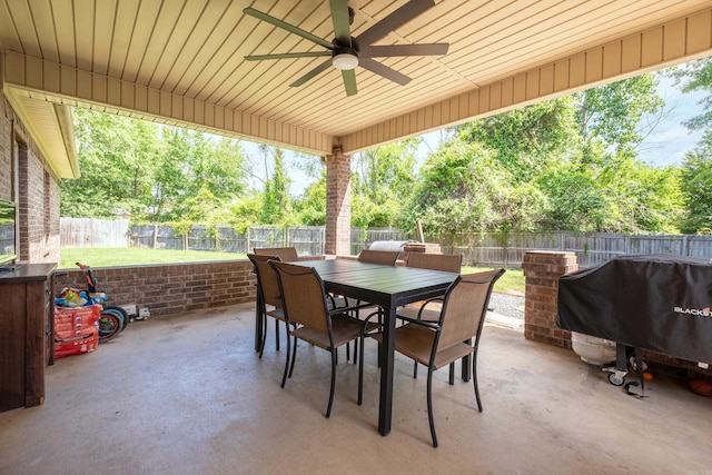 3407 Hemlock Cv, Benton, AR 72015 - view of patio / terrace featuring a ceiling fan, outdoor dining space, a fenced backyard, and grilling area