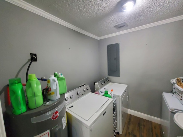 690 Redwood Dr, Piggott, AR 72454 - clothes washing area featuring washer and dryer, electric panel, water heater, dark wood-type flooring, and ornamental molding