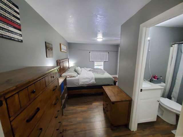 690 Redwood Dr, Piggott, AR 72454 - bedroom with dark wood-style floors