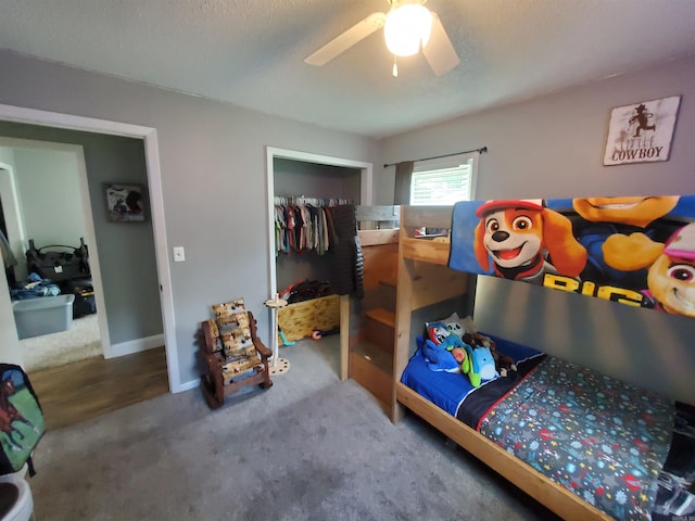 690 Redwood Dr, Piggott, AR 72454 - carpeted bedroom with a closet, a ceiling fan, and baseboards