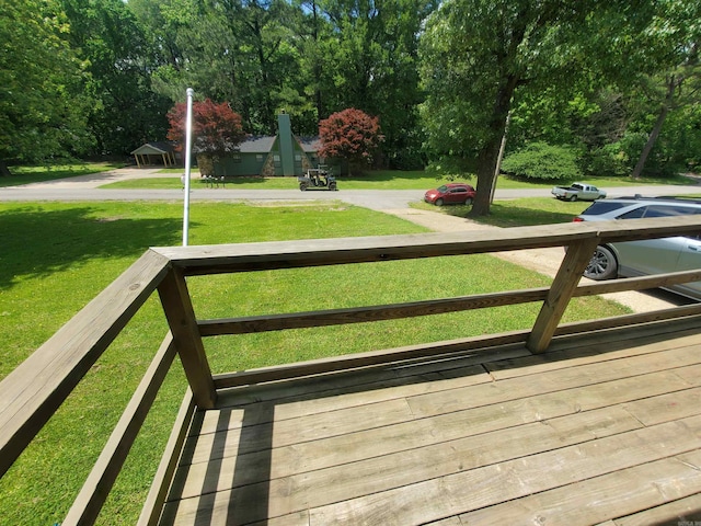 690 Redwood Dr, Piggott, AR 72454 - wooden terrace featuring a yard