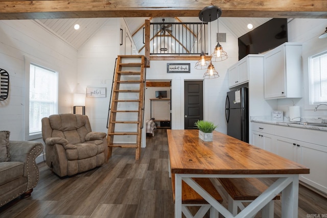 948 Sunny Slope Rd, Edgemont, AR 72044 - kitchen with butcher block counters, freestanding refrigerator, high vaulted ceiling, open floor plan, and wooden ceiling