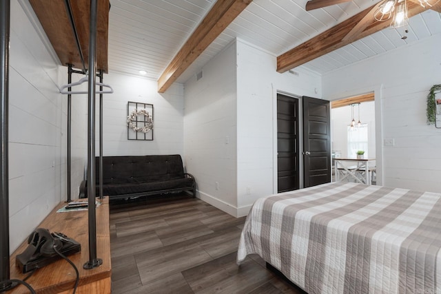 948 Sunny Slope Rd, Edgemont, AR 72044 - bedroom featuring beamed ceiling, dark wood-type flooring, a ceiling fan, and concrete block wall