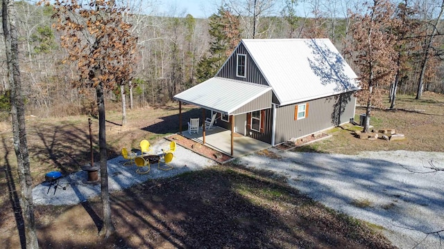 948 Sunny Slope Rd, Edgemont, AR 72044 - aerial view of property and surrounding area with a heavily wooded area