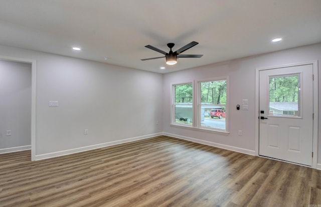 1114 Edgehill Dr, Benton, AR 72015 - unfurnished living room featuring wood finished floors, baseboards, a ceiling fan, and recessed lighting