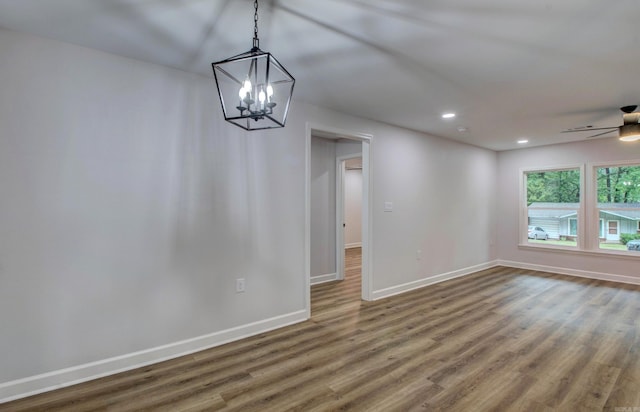 1114 Edgehill Dr, Benton, AR 72015 - unfurnished dining area featuring wood finished floors, baseboards, a chandelier, ceiling fan, and recessed lighting