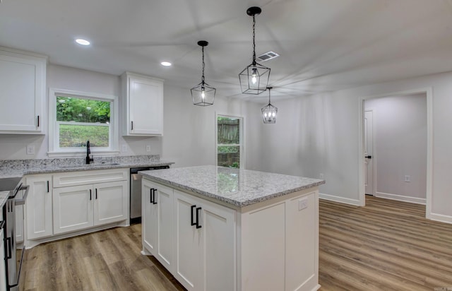 1114 Edgehill Dr, Benton, AR 72015 - kitchen featuring a sink, dishwasher, light wood-style flooring, white cabinets, and recessed lighting