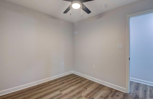 1114 Edgehill Dr, Benton, AR 72015 - unfurnished room with wood finished floors, baseboards, a ceiling fan, and a smoke detector