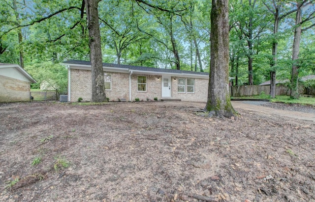1114 Edgehill Dr, Benton, AR 72015 - ranch-style house featuring fence, brick siding, and cooling unit