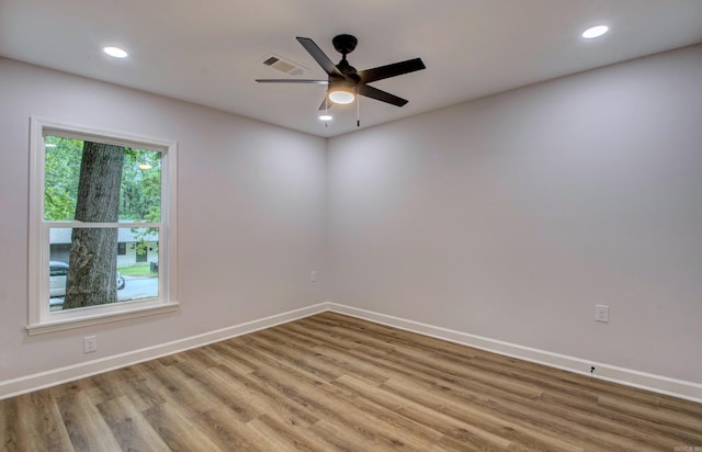 1114 Edgehill Dr, Benton, AR 72015 - unfurnished room with wood finished floors, baseboards, a ceiling fan, and recessed lighting