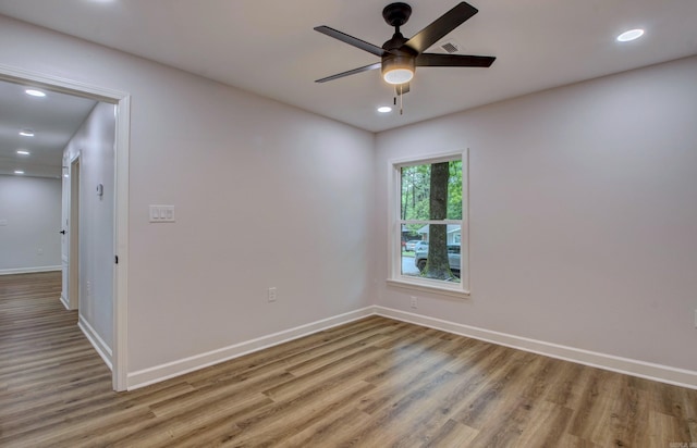 1114 Edgehill Dr, Benton, AR 72015 - spare room with light wood-style floors, a ceiling fan, baseboards, and recessed lighting
